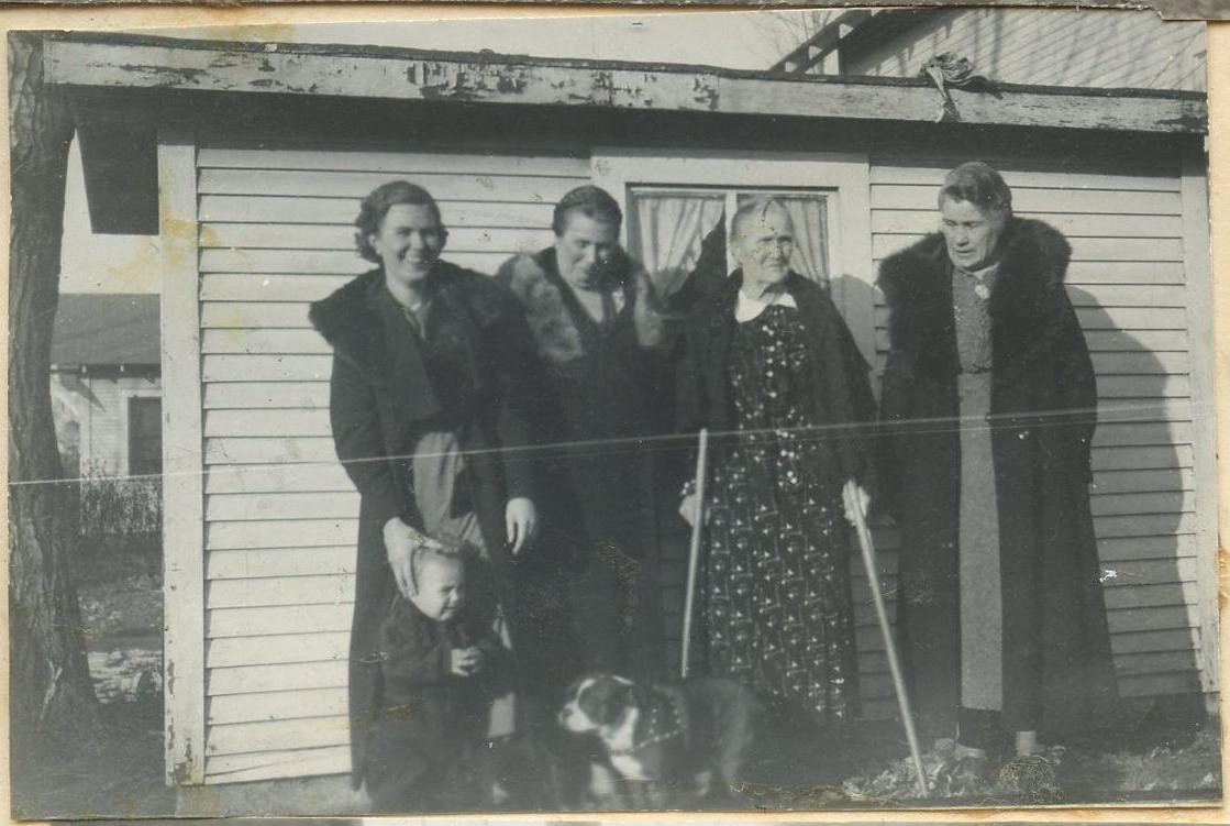 Photograph of Millie with her daughter Ona and others.